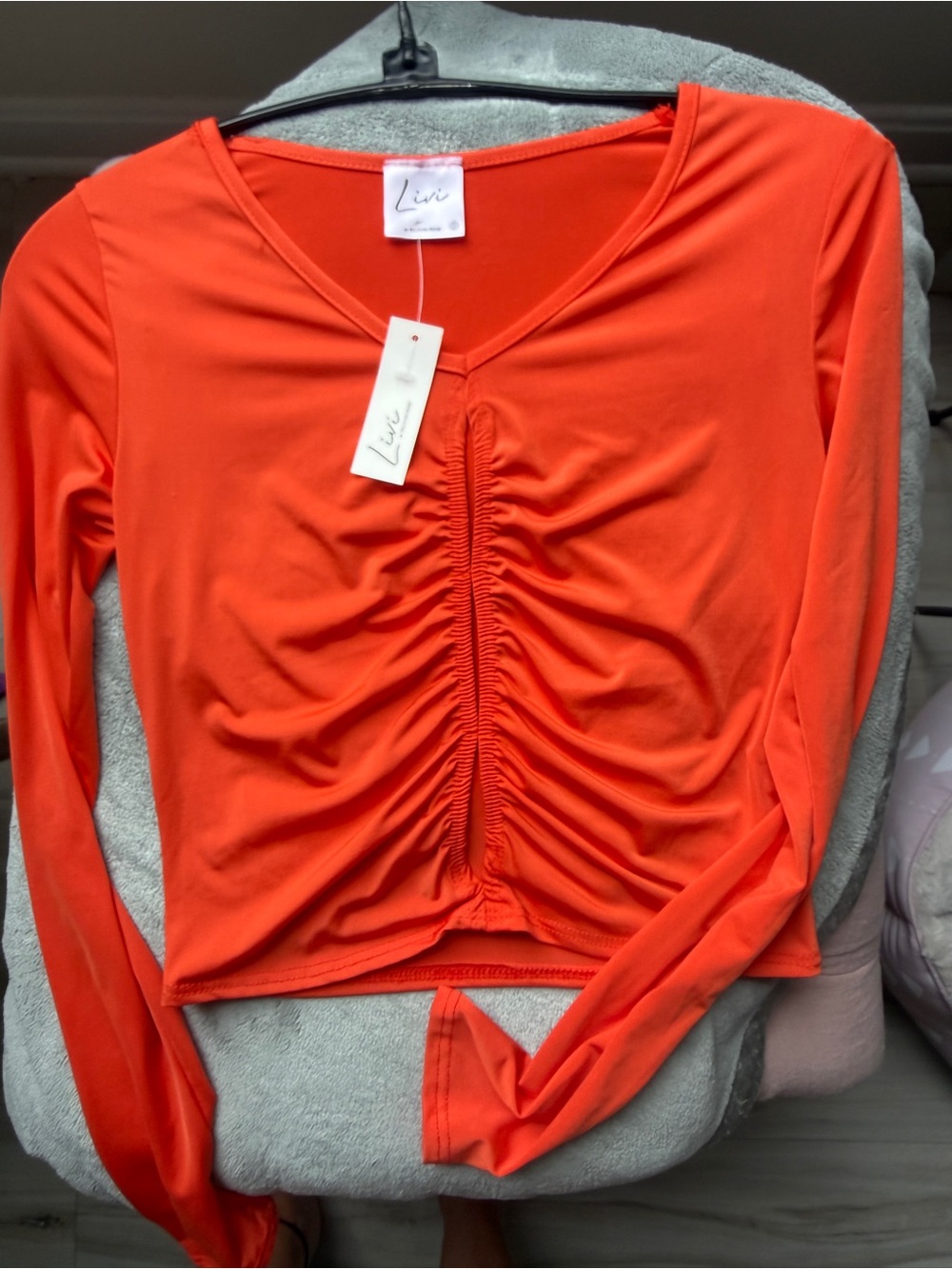 Olivia Rae Long-Sleeve Ruched V-Neck Crop Top in Bright Orange